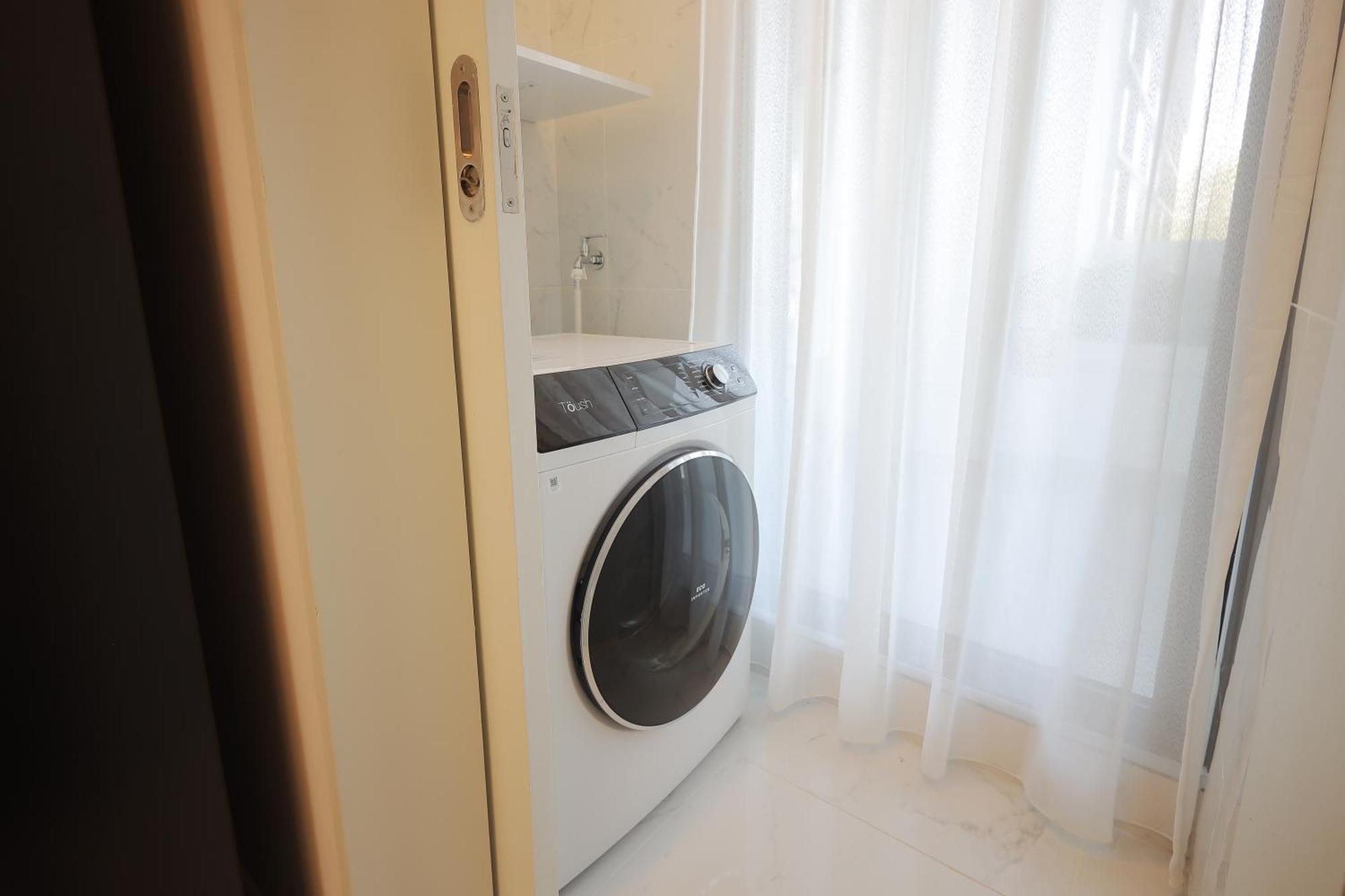 The Riyaz Lavanya Langkawi パンタイ・サナング エクステリア 写真 A washing machine